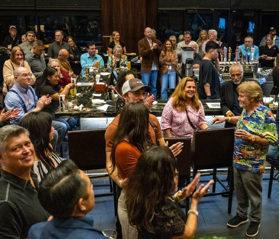 a crowd inside of a theater lobby attending a film festival
